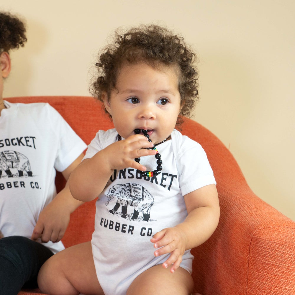 Woonsocket Rubber Co. Onesie